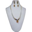 Tumble pendant synthetic pearl necklace.